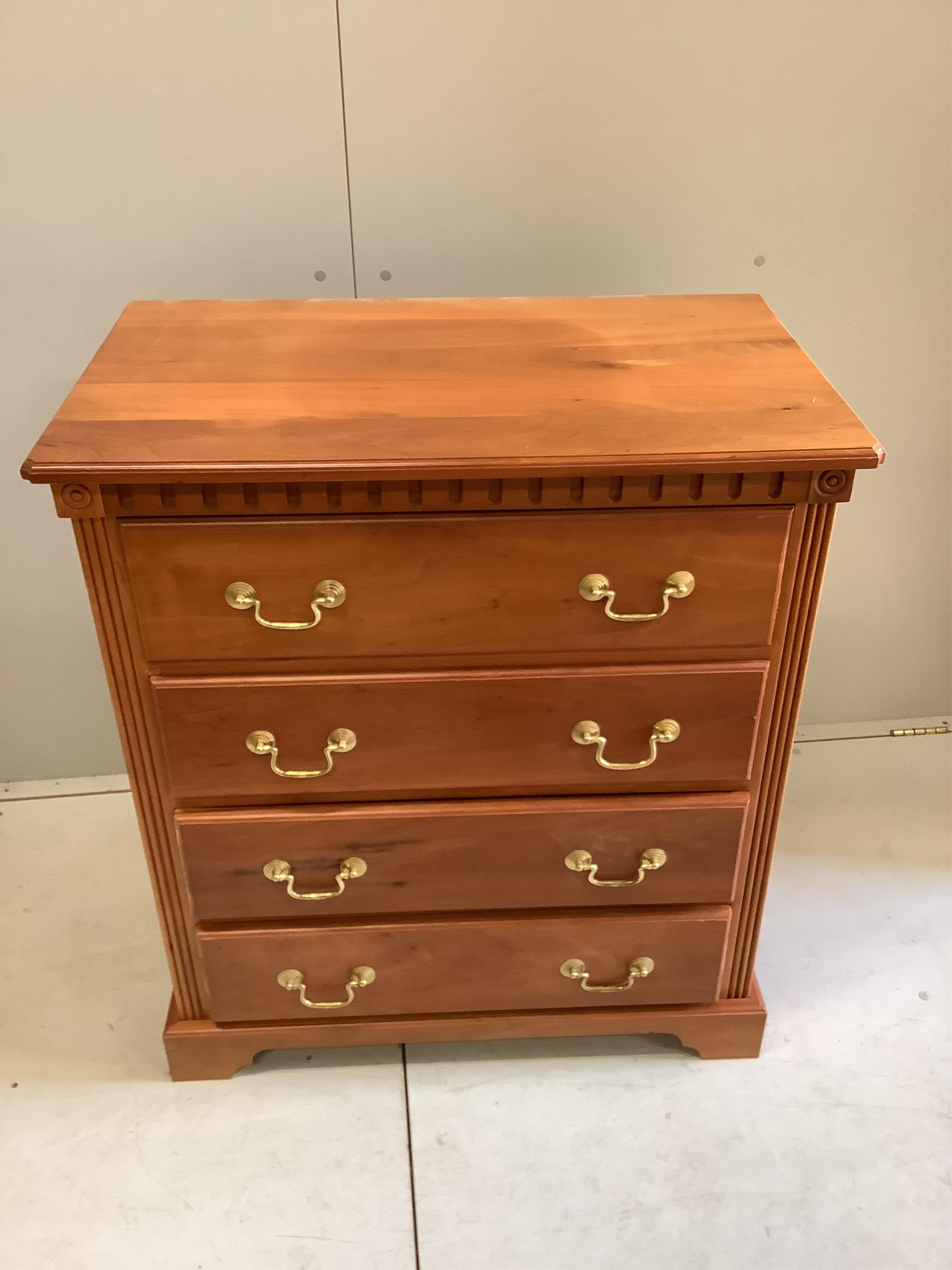 A reproduction cherry low chest of four drawers, width 82cm, depth 48cm, height 91cm. Condition - fair-good